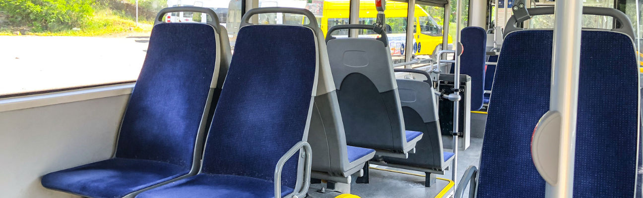 Inside of a bus focus on seats